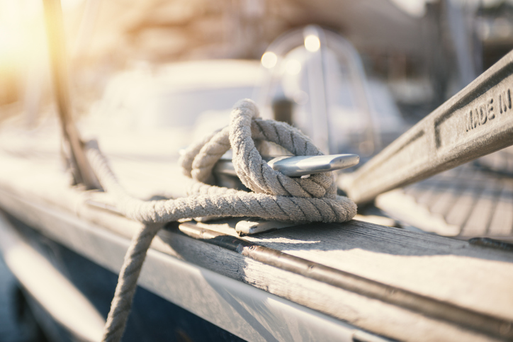 mooring rope tied to dock clete